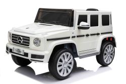 Elektrische Kinderauto Mercedes G500 12V, wit, 2.4 GHz afstandsbediening, USB / SD-ingang, achtervering, lithiumbatterij, LED-verlichting, ORIGINELE licentie.